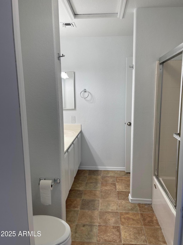 full bathroom featuring vanity, shower / bath combination with glass door, and toilet