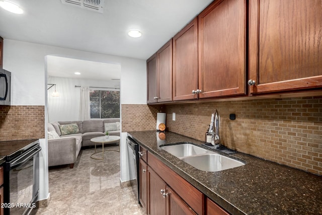 kitchen featuring sink, tasteful backsplash, black electric range, dark stone countertops, and stainless steel dishwasher