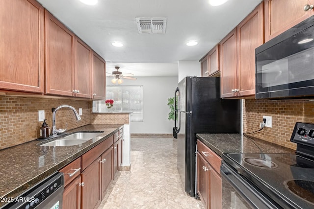 kitchen with sink, backsplash, ceiling fan, and black appliances