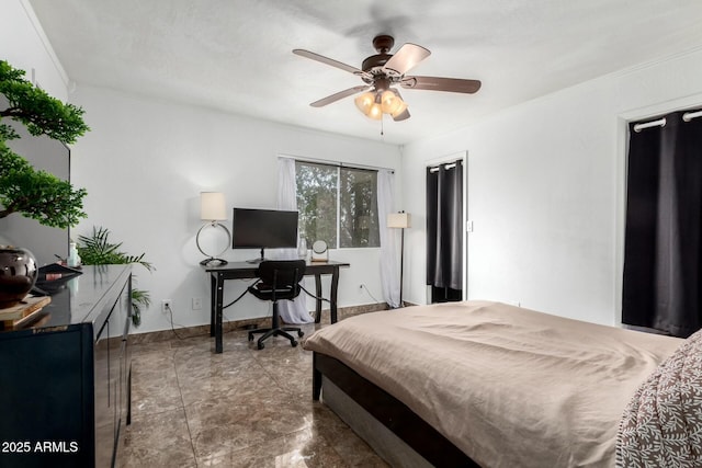 bedroom with crown molding and ceiling fan