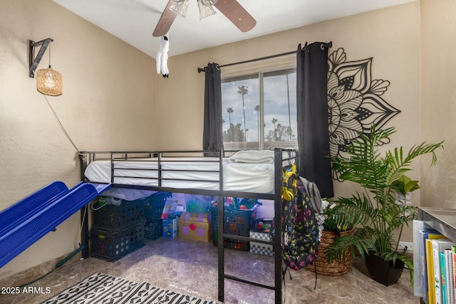 bedroom featuring ceiling fan