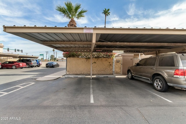 view of vehicle parking featuring a carport