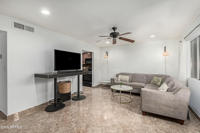 living room with ceiling fan