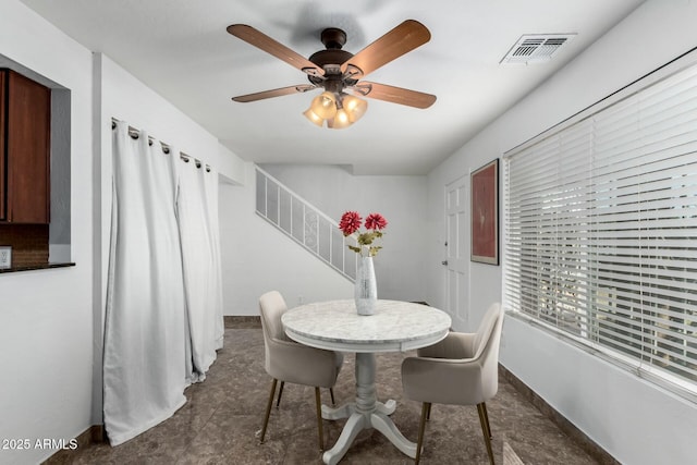 dining area featuring ceiling fan