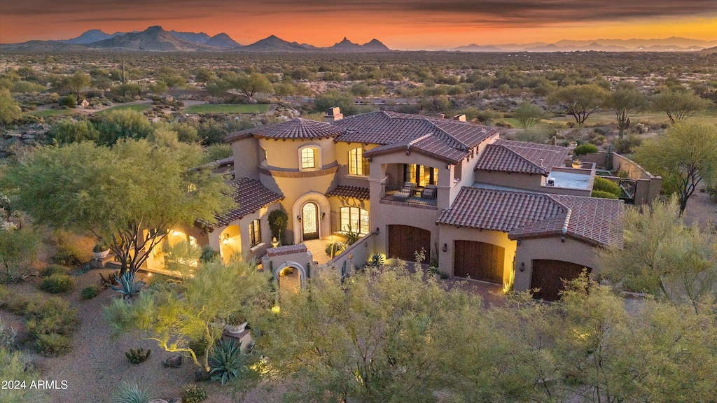 mediterranean / spanish home with a mountain view