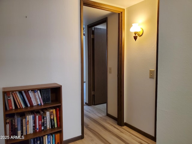 hallway featuring light wood-type flooring