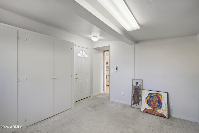 interior space with light colored carpet