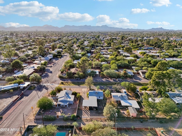 birds eye view of property featuring a mountain view