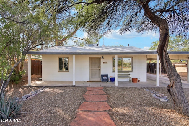 single story home with a patio area