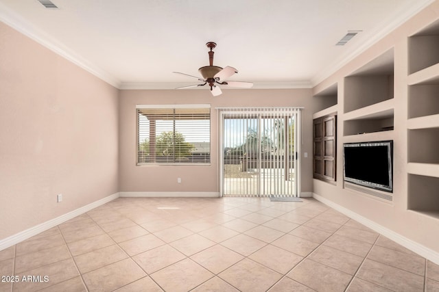 unfurnished living room featuring crown molding, built in shelves, ceiling fan, and light tile patterned flooring