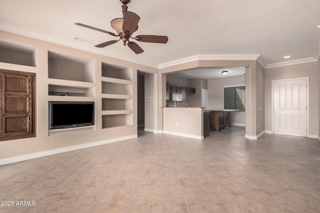 unfurnished living room with ornamental molding, light tile patterned floors, ceiling fan, and built in shelves