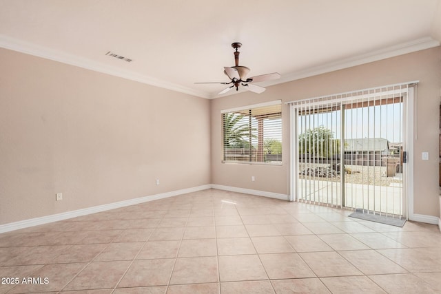 empty room with crown molding, light tile patterned flooring, and ceiling fan