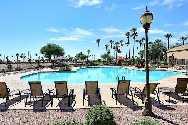 view of pool with a gazebo and a patio