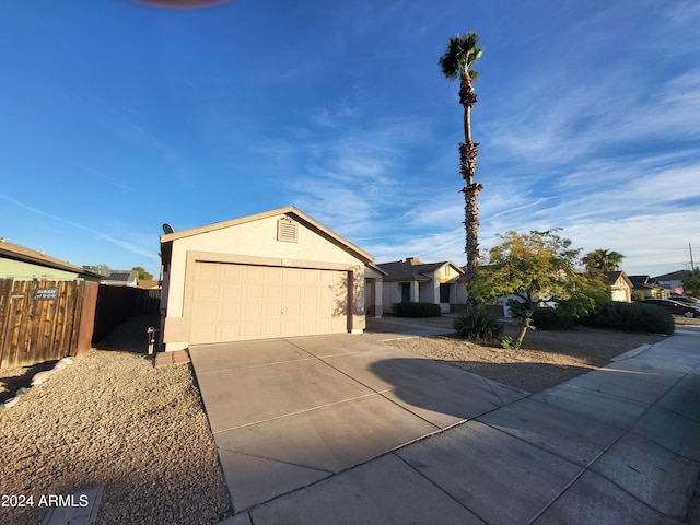 view of front of property with a garage