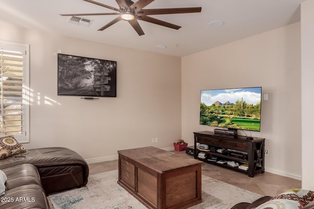 living room with ceiling fan