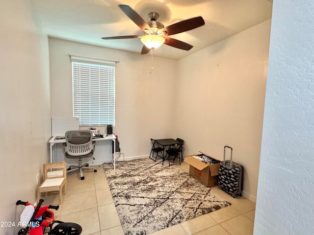 office featuring ceiling fan and light tile patterned floors