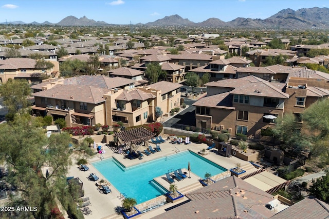 birds eye view of property with a residential view and a mountain view