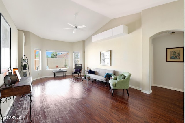 sitting room featuring vaulted ceiling, dark wood-type flooring, and ceiling fan