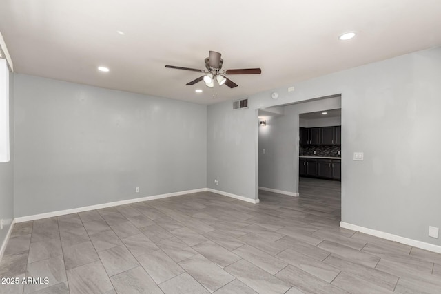 2936 E Beck Ln, Phoenix, AZ 85032 - spare room featuring a ceiling fan, baseboards, visible vents, and recessed lighting
