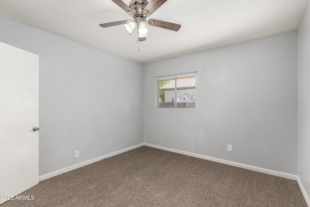 2936 E Beck Ln, Phoenix, AZ 85032 - unfurnished room with carpet floors, baseboards, and ceiling fan