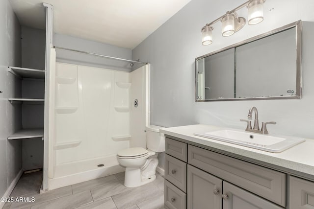 2936 E Beck Ln, Phoenix, AZ 85032 - bathroom featuring vanity, tile patterned floors, toilet, and a shower