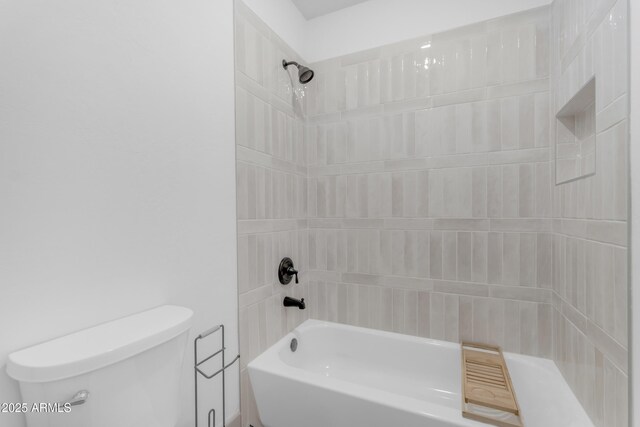 full bathroom featuring toilet and shower / washtub combination