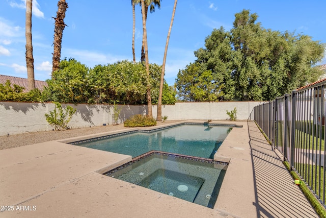 view of pool featuring a fenced backyard, a fenced in pool, and an in ground hot tub