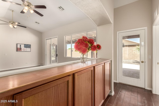 16288 W Hadley St, Goodyear, AZ 85338 - bar featuring lofted ceiling, dark wood-style floors, and ceiling fan