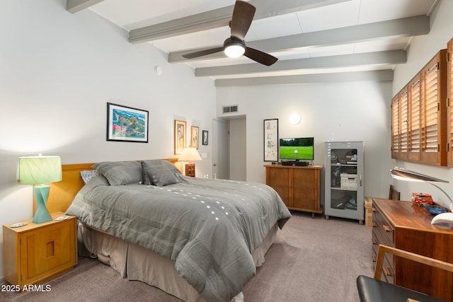 bedroom featuring lofted ceiling with beams, visible vents, light carpet, and a ceiling fan