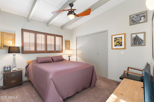 bedroom with a closet, vaulted ceiling with beams, ceiling fan, and carpet flooring