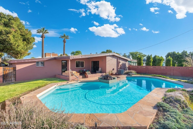 view of pool with a ceiling fan, a fenced backyard, and a fenced in pool