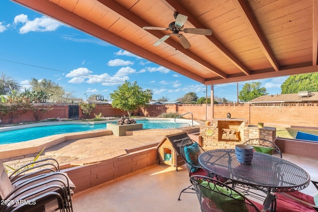 view of patio featuring ceiling fan, outdoor dining area, a fenced in pool, and a fenced backyard