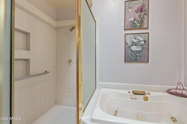 full bathroom featuring a tub with jets and a shower stall