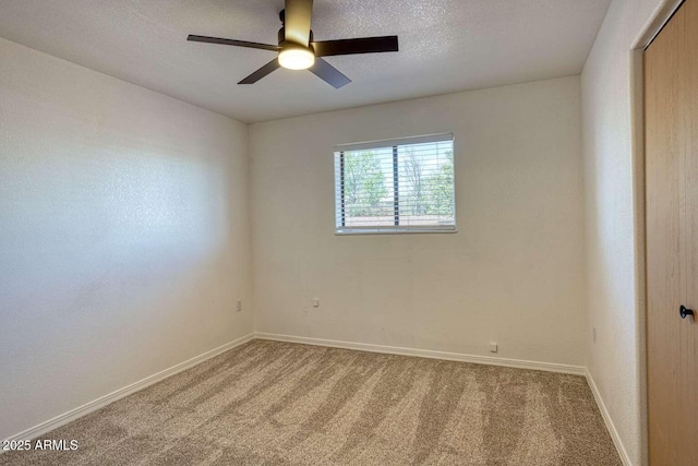 813 N Glenrosa Blvd, Taylor, AZ 85939 - spare room with carpet floors, baseboards, and ceiling fan