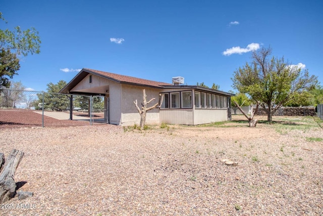 813 N Glenrosa Blvd, Taylor, AZ 85939 - back of property featuring a sunroom and a carport