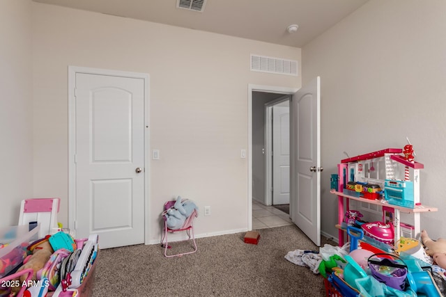 game room featuring visible vents and carpet