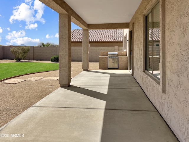 view of patio featuring a fenced backyard