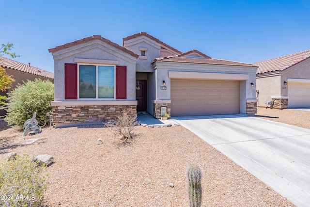 view of front of property with a garage