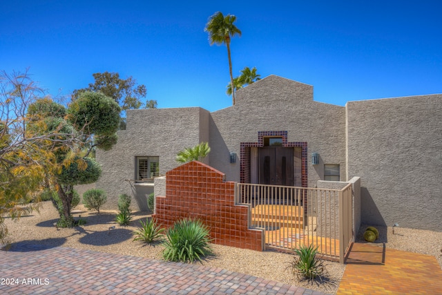 view of adobe home