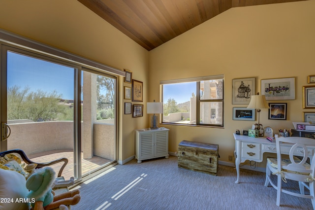 interior space featuring light carpet, lofted ceiling, and wood ceiling