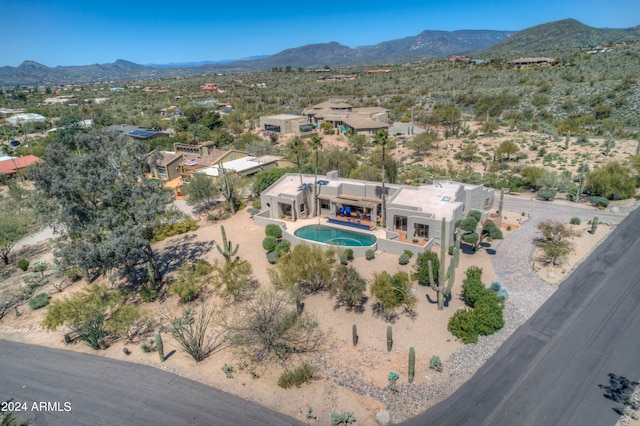 bird's eye view with a mountain view