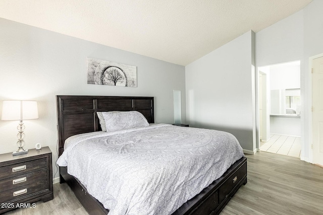 1601 E Cindy St, Chandler, AZ 85225 - bedroom with lofted ceiling, light wood-style floors, and baseboards