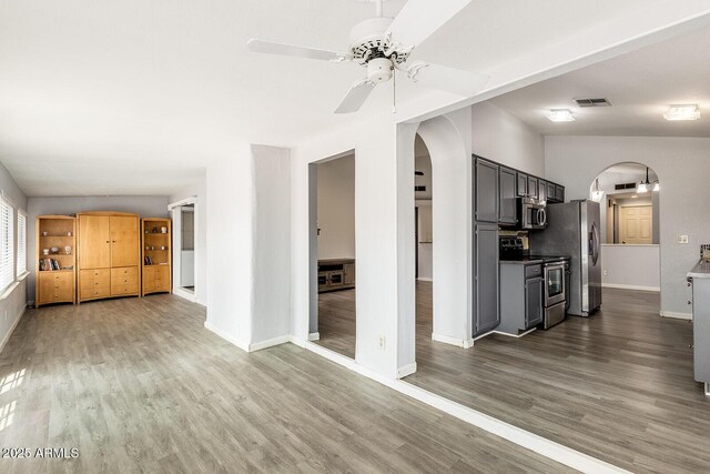 1601 E Cindy St, Chandler, AZ 85225 - unfurnished living room with ceiling fan, baseboards, and arched walkways