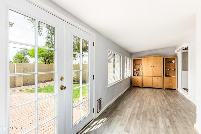 1601 E Cindy St, Chandler, AZ 85225 - doorway with plenty of natural light, light wood-style flooring, and baseboards