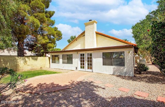 1601 E Cindy St, Chandler, AZ 85225 - back of property featuring a chimney, french doors, fence, a patio area, and stucco siding