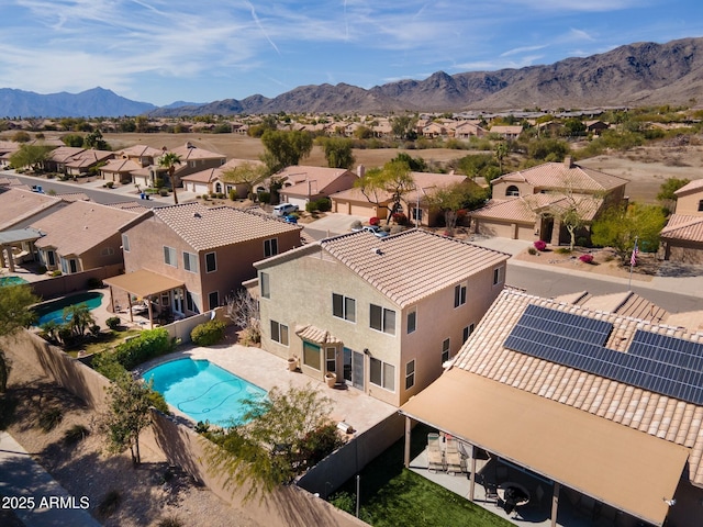 bird's eye view featuring a residential view and a mountain view