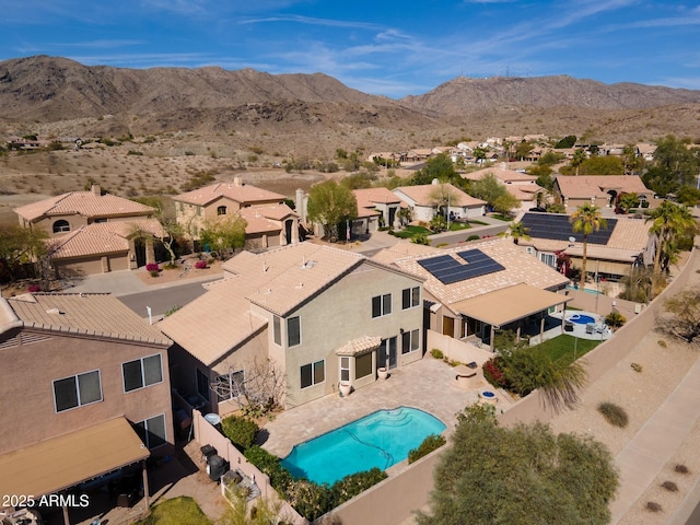 bird's eye view with a residential view and a mountain view