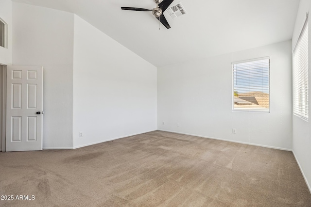 bonus room with light carpet, vaulted ceiling, visible vents, and a ceiling fan