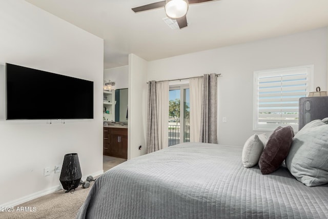 bedroom featuring ceiling fan, carpet floors, access to outside, and ensuite bath