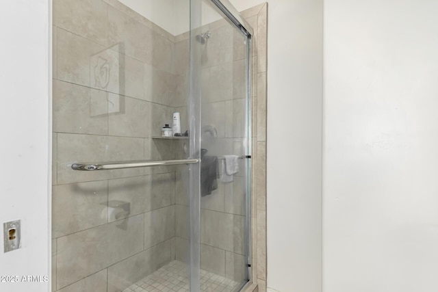 bathroom featuring walk in shower